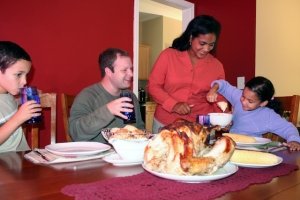 interfaith family having dinner