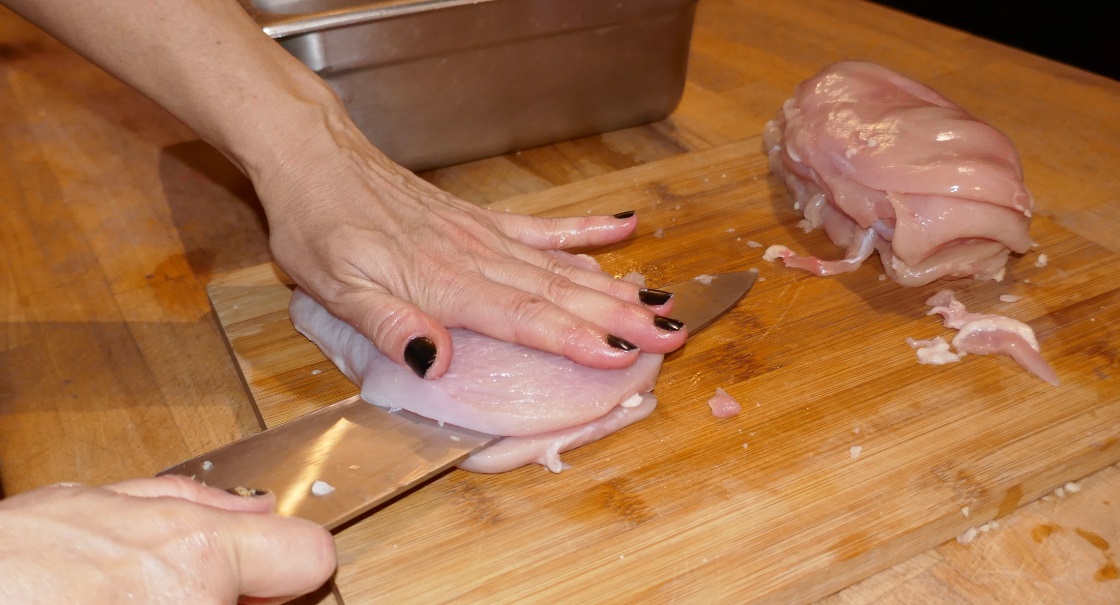 chicken cutting in Laura's cooking class